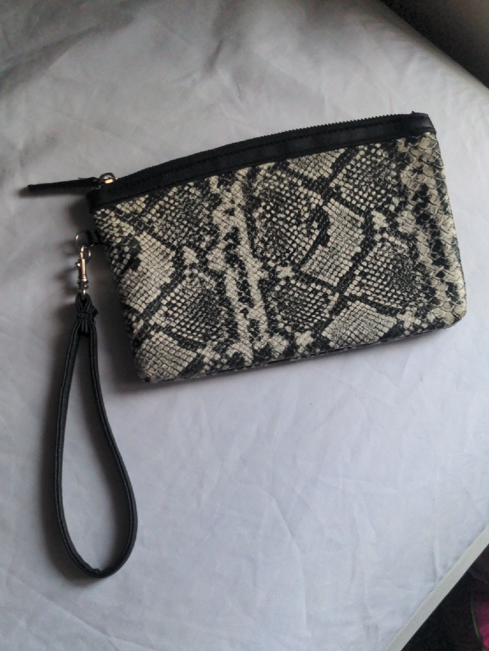 Snake Print Wristlet Clutch in Black & Cream